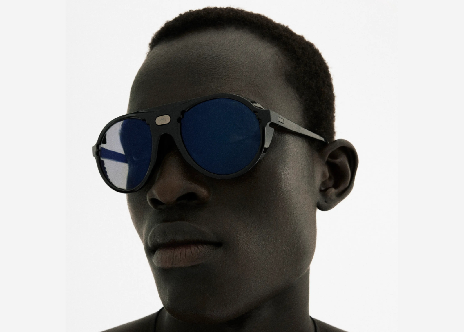 District Vision Kazu Tourer in Black D Blue Ice Sunglasses on Model